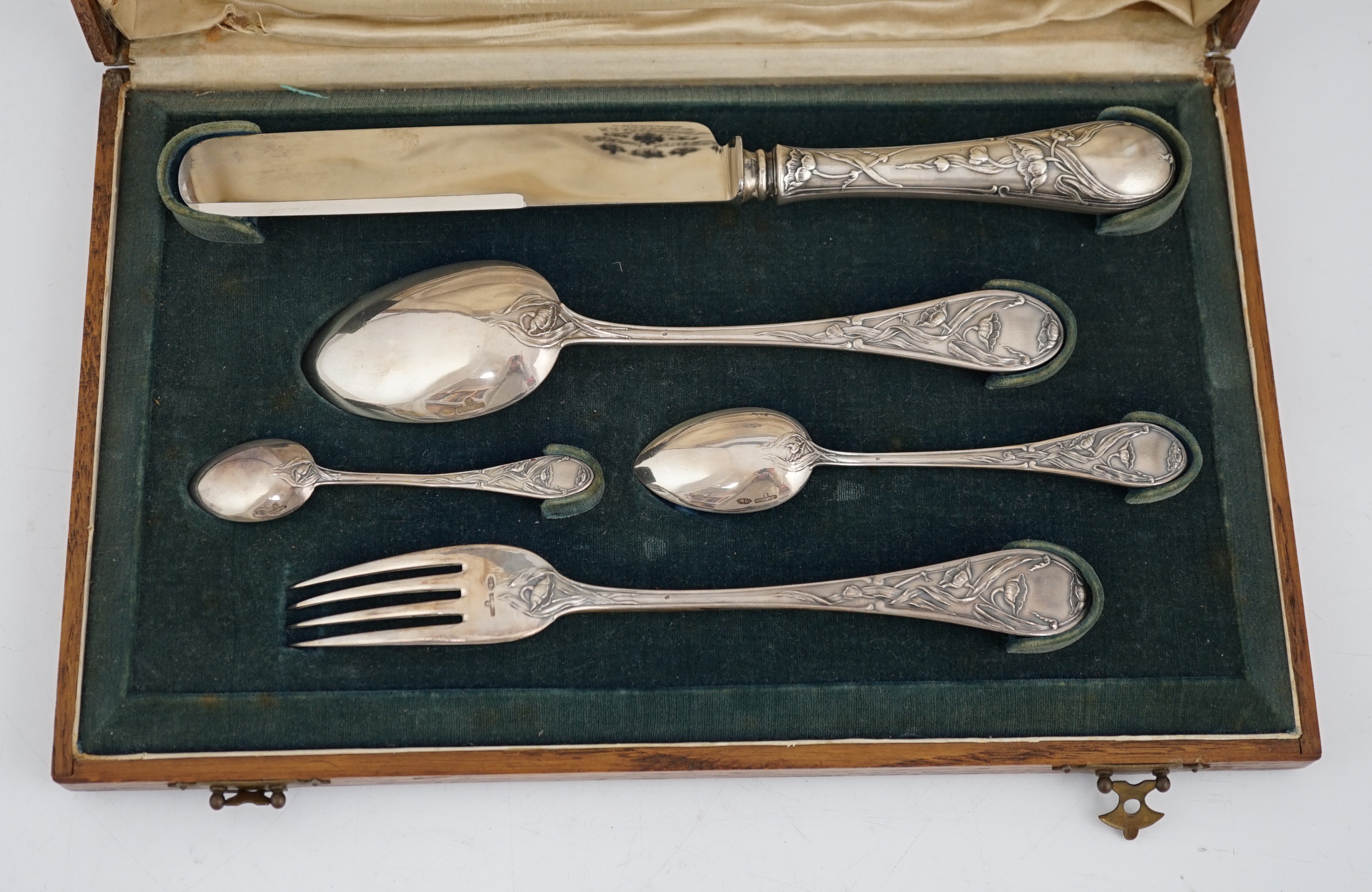 An early 20th century Russian 84 zolotnik silver five piece personal cutlery set by Ivan Khlebnikov